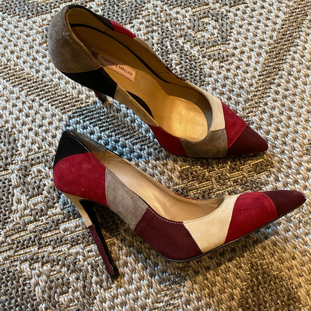 Plaid pointy heels in various shades of red